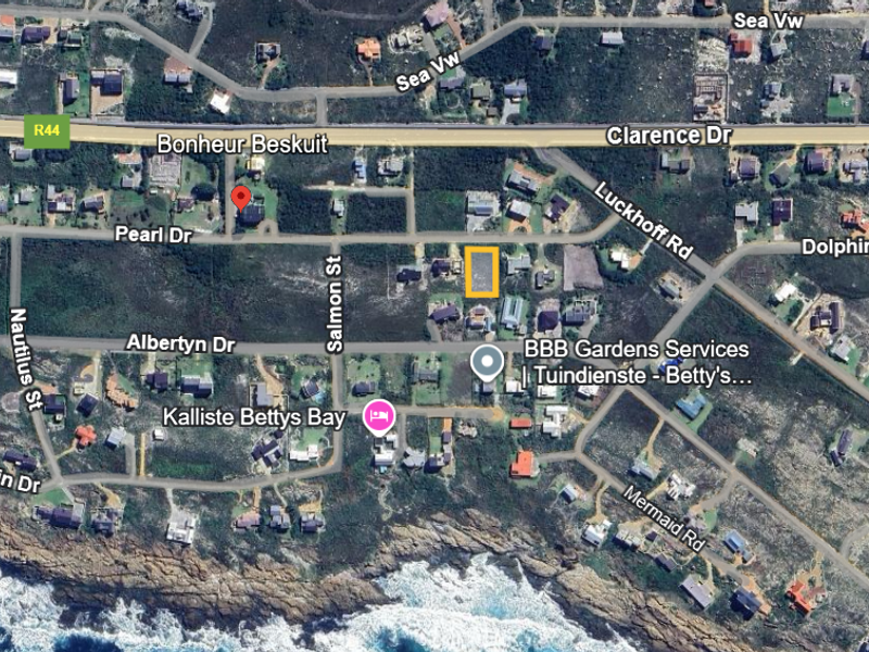 An aerial satellite view showing the location of the vacant residential land plot within the coastal neighborhood.