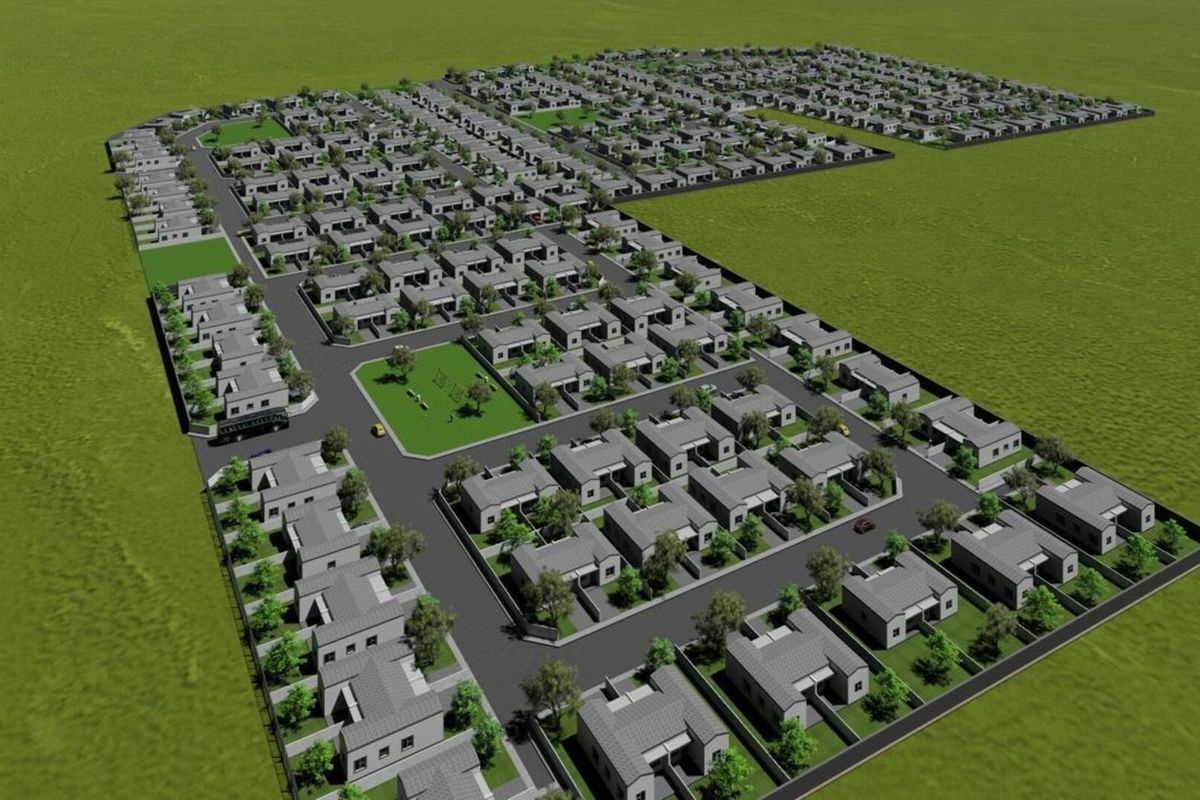 An aerial 3D render showing the layout of a residential housing development with paved streets, individual housing units, and a central green space.