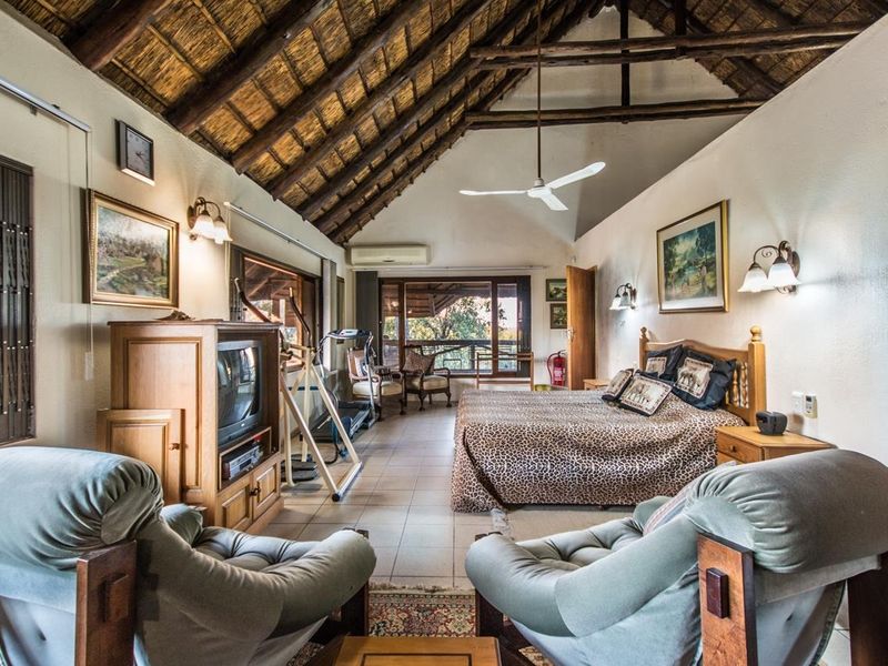 Spacious 5-Bedroom Thatch Roof Home For Sale in Marloth Park! - Photo 8