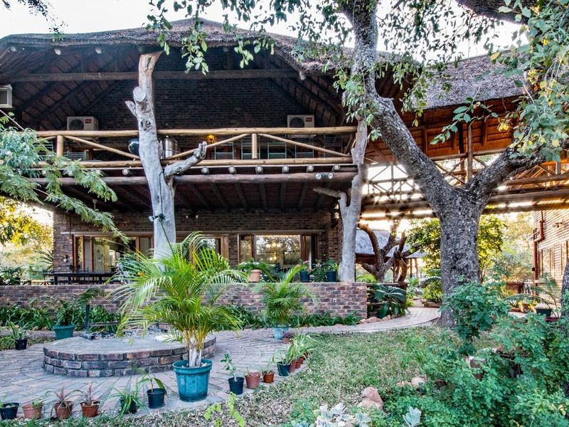 Spacious 5-Bedroom Thatch Roof Home For Sale in Marloth Park! - Photo 3