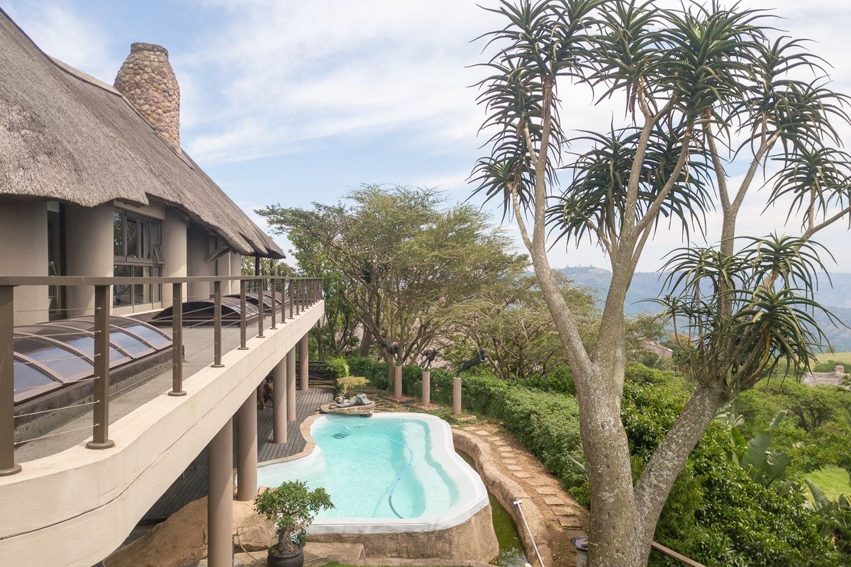 Phezulu Estate Stunner with 1000 Hills Valley Views - Photo 4