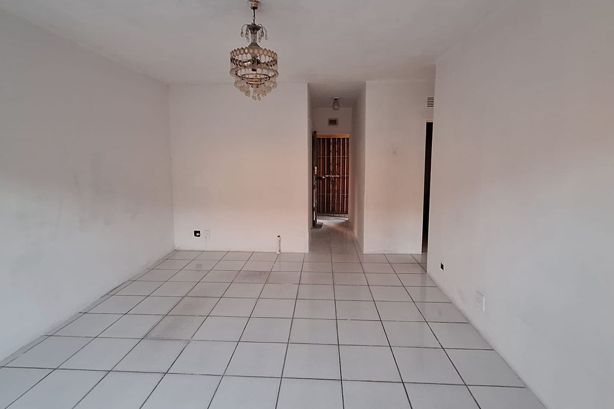 Looking for a fixer upper? Two Bedroom Apartment in Secure Block - Photo 5