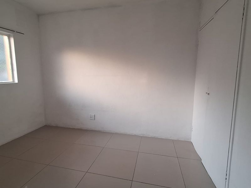 Looking for a fixer upper? Two Bedroom Apartment in Secure Block - Photo 10