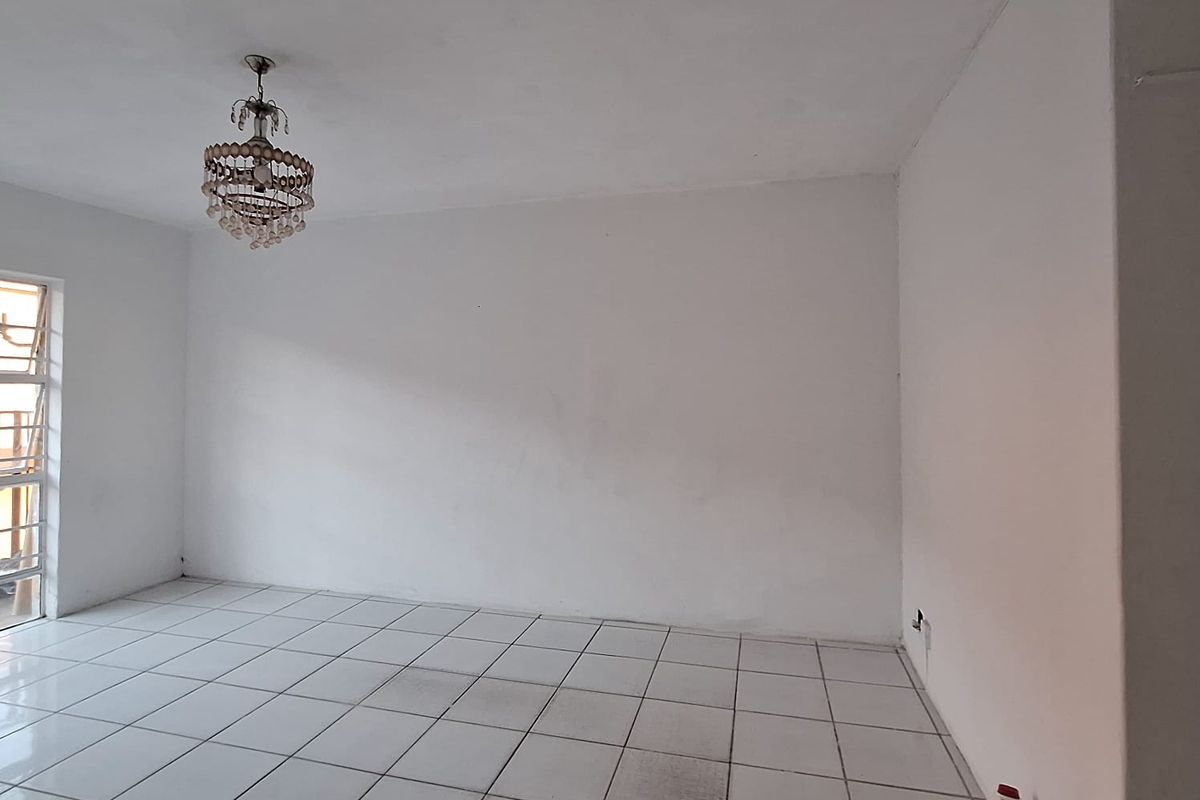 Looking for a fixer upper? Two Bedroom Apartment in Secure Block - Photo 3