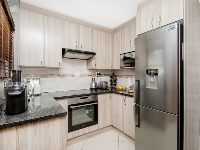 Neat & Spacious 2-Bedroom Haven in Cosmo City - Photo 9