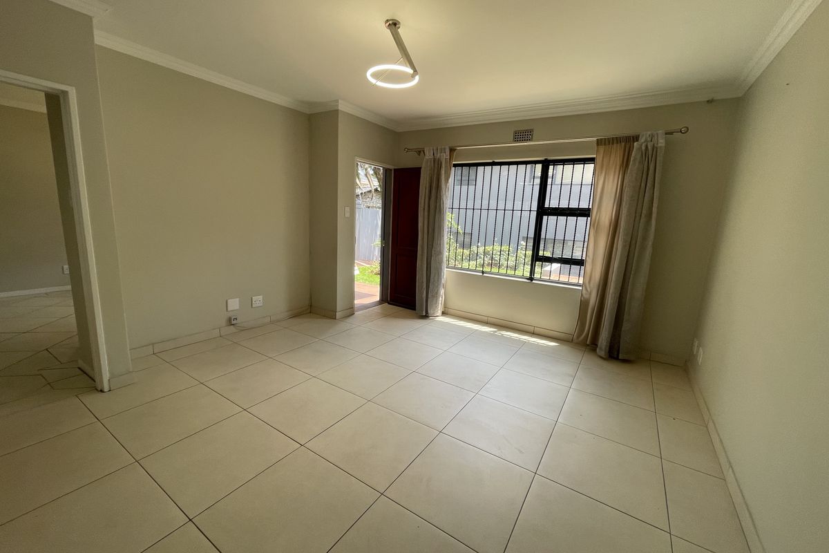 Modern 1-Bedroom Unit with Private Garden & Excellent Security - Photo 2