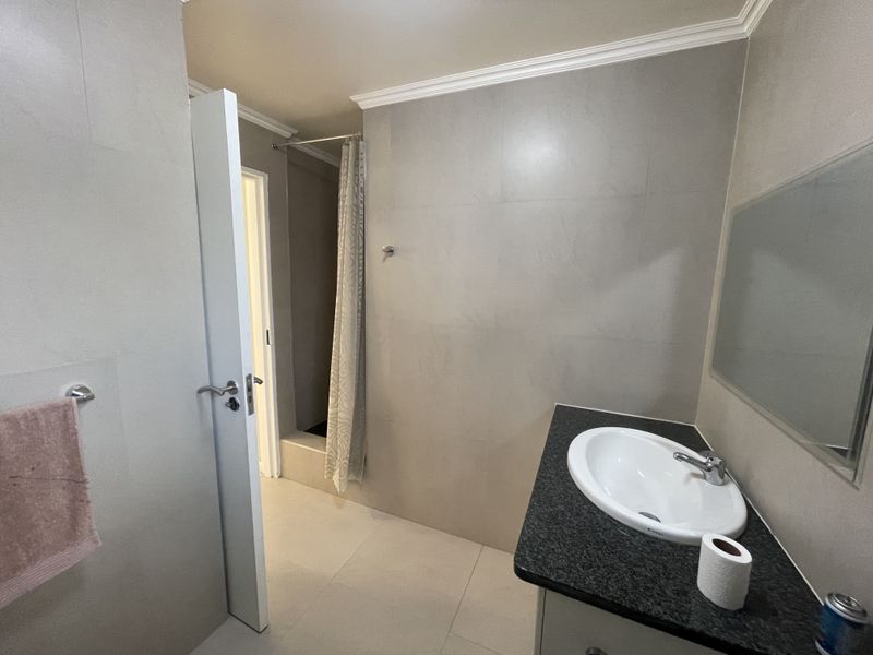 Modern 1-Bedroom Unit with Private Garden & Excellent Security - Photo 9