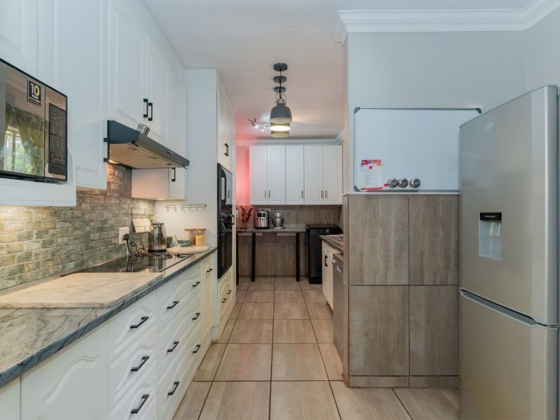 Renovated 4 Bed 2 Bath Family Home with Pool on a Large Stand in Farrarmere - Photo 10