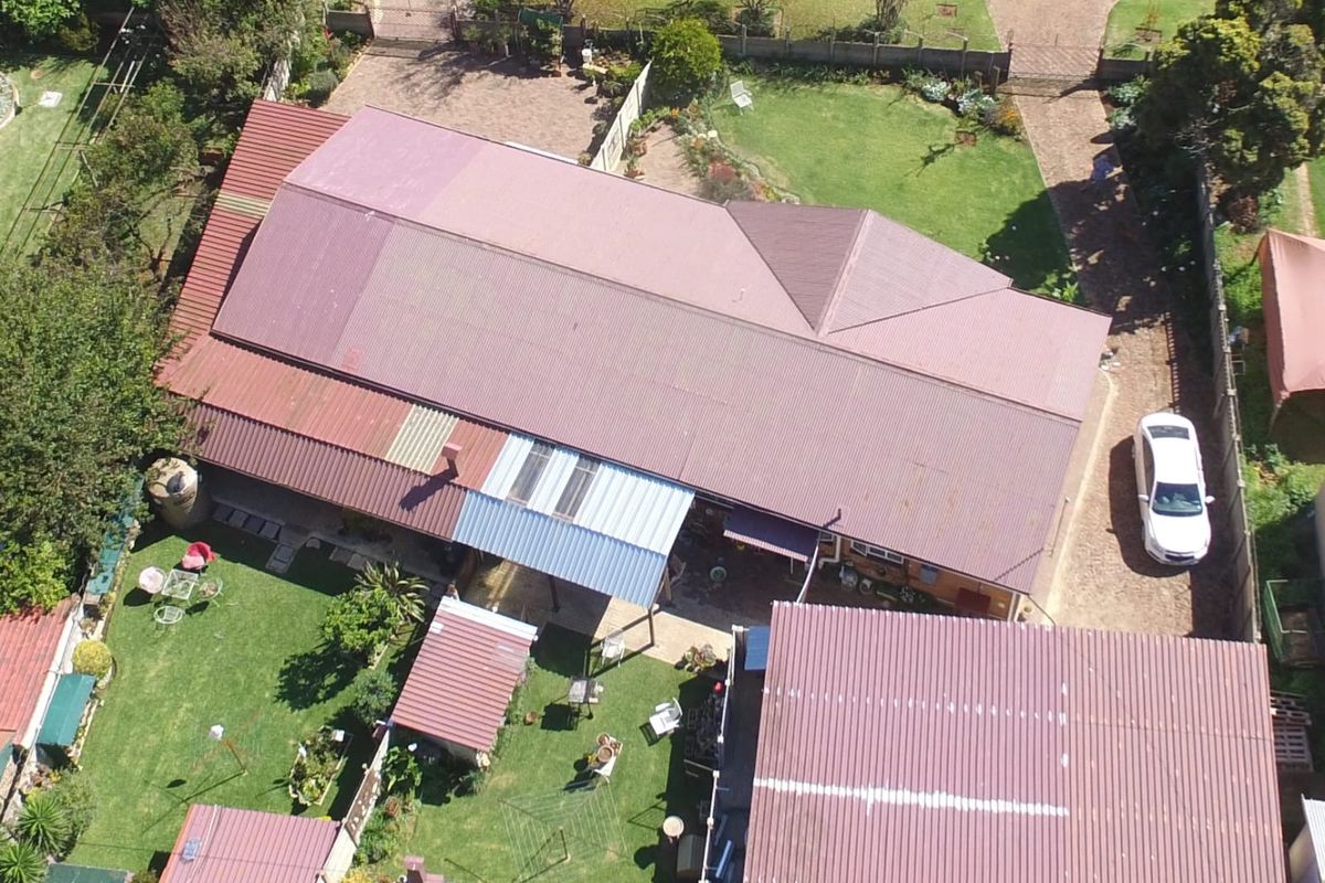 High-Yield Investment Opportunity in Delmas! 4 Bed Main + 2 Bed cottage + 1 bed cottage - Photo 2