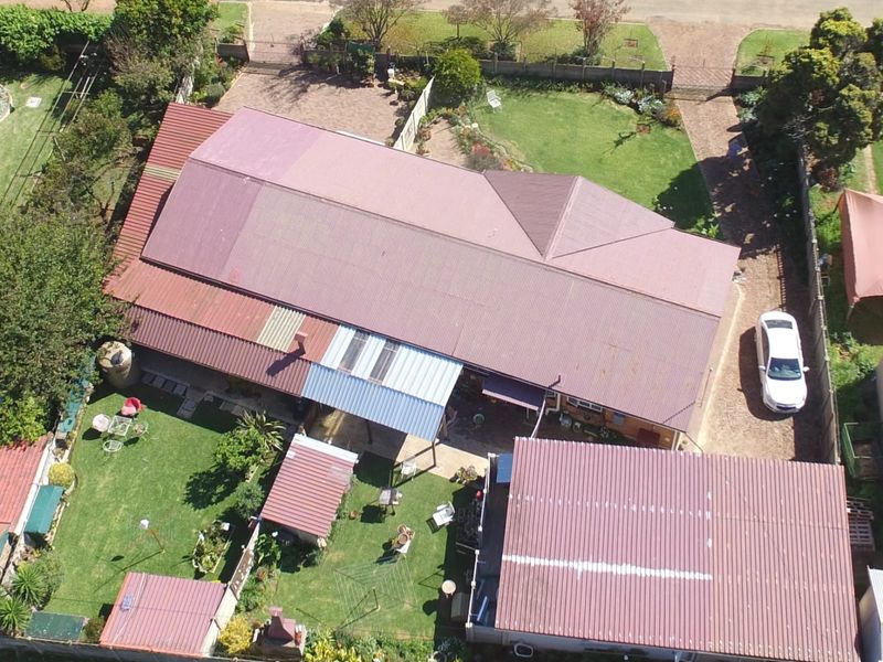 High-Yield Investment Opportunity in Delmas! 4 Bed Main + 2 Bed cottage + 1 bed cottage - Photo 2