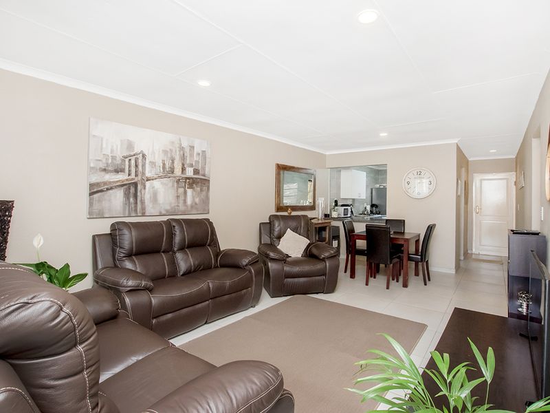 Beautifully Maintained Modern Townhouse in Sought-After Rangeview Ext. 4 - Photo 3