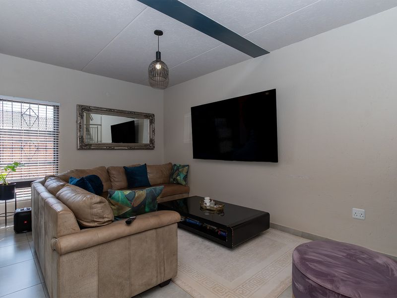 Modern Elegance Meets Practical Living in This Stunning Duplex Cluster - Photo 2