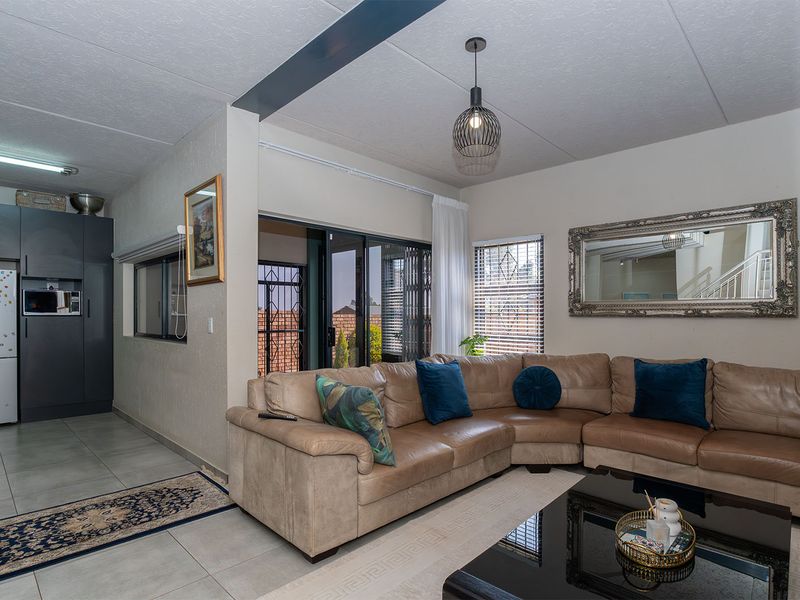 Modern Elegance Meets Practical Living in This Stunning Duplex Cluster - Photo 3