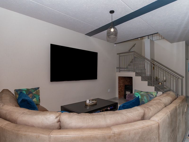 Modern Elegance Meets Practical Living in This Stunning Duplex Cluster - Photo 9