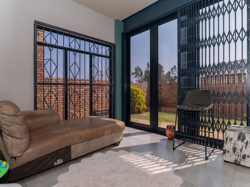 Modern Elegance Meets Practical Living in This Stunning Duplex Cluster - Photo 10