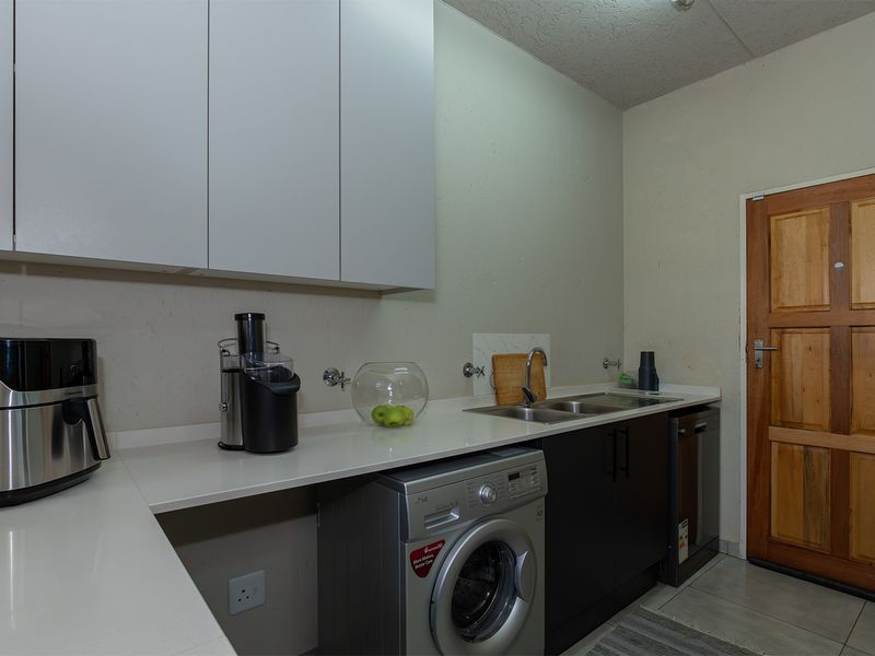 Modern Elegance Meets Practical Living in This Stunning Duplex Cluster - Photo 7