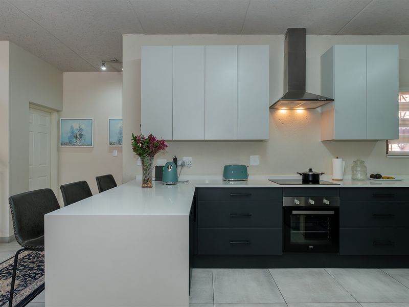 Modern Elegance Meets Practical Living in This Stunning Duplex Cluster - Photo 6