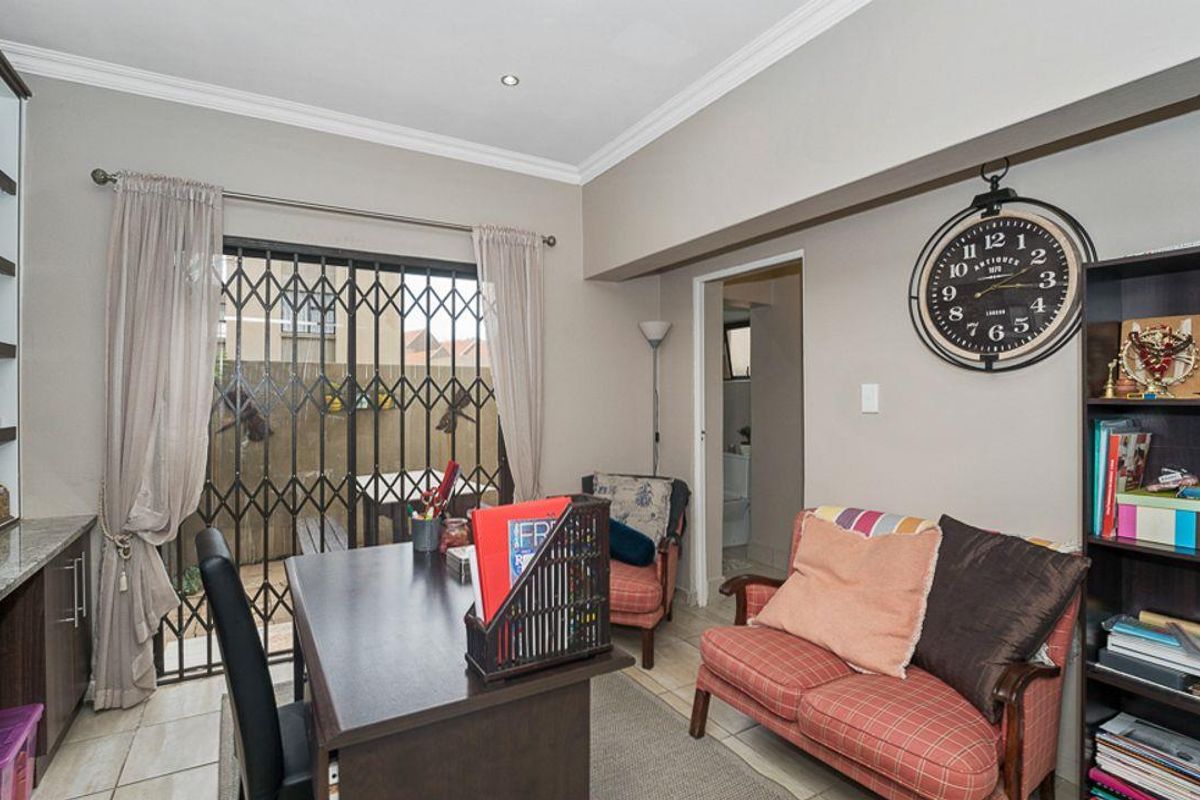 Picture-Perfect Renovated 3 Bedroom 2.5 Bathroom Home with Pool in Secure Estate - Photo 4