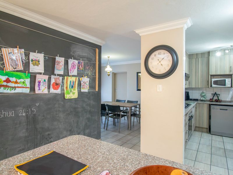 Beautiful Family Home in a Peaceful Area of Moreleta Park - Photo 9