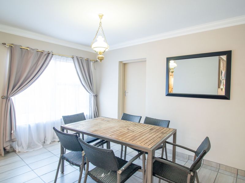 Beautiful Family Home in a Peaceful Area of Moreleta Park - Photo 7