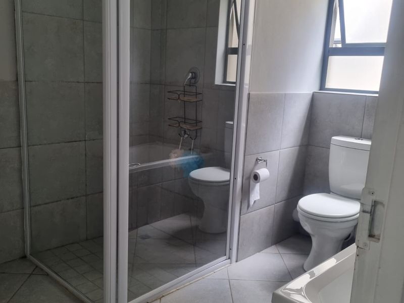 Charming Family Starter! Secure Ground Floor Home with Private Feel - Photo 10