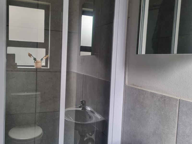 Charming Family Starter! Secure Ground Floor Home with Private Feel - Photo 9