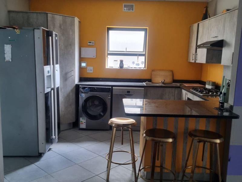 Charming Family Starter! Secure Ground Floor Home with Private Feel - Photo 6