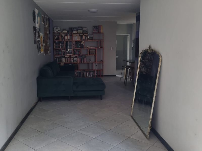 Charming Family Starter! Secure Ground Floor Home with Private Feel - Photo 4