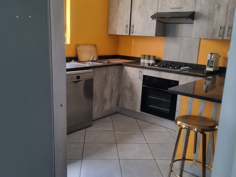 Charming Family Starter! Secure Ground Floor Home with Private Feel - Photo 5
