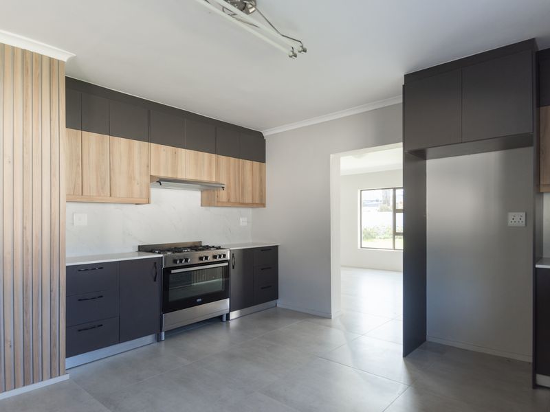 An Exceptionally Spacious, Fully Renovated Family Retreat in Myburgh Park - Photo 9