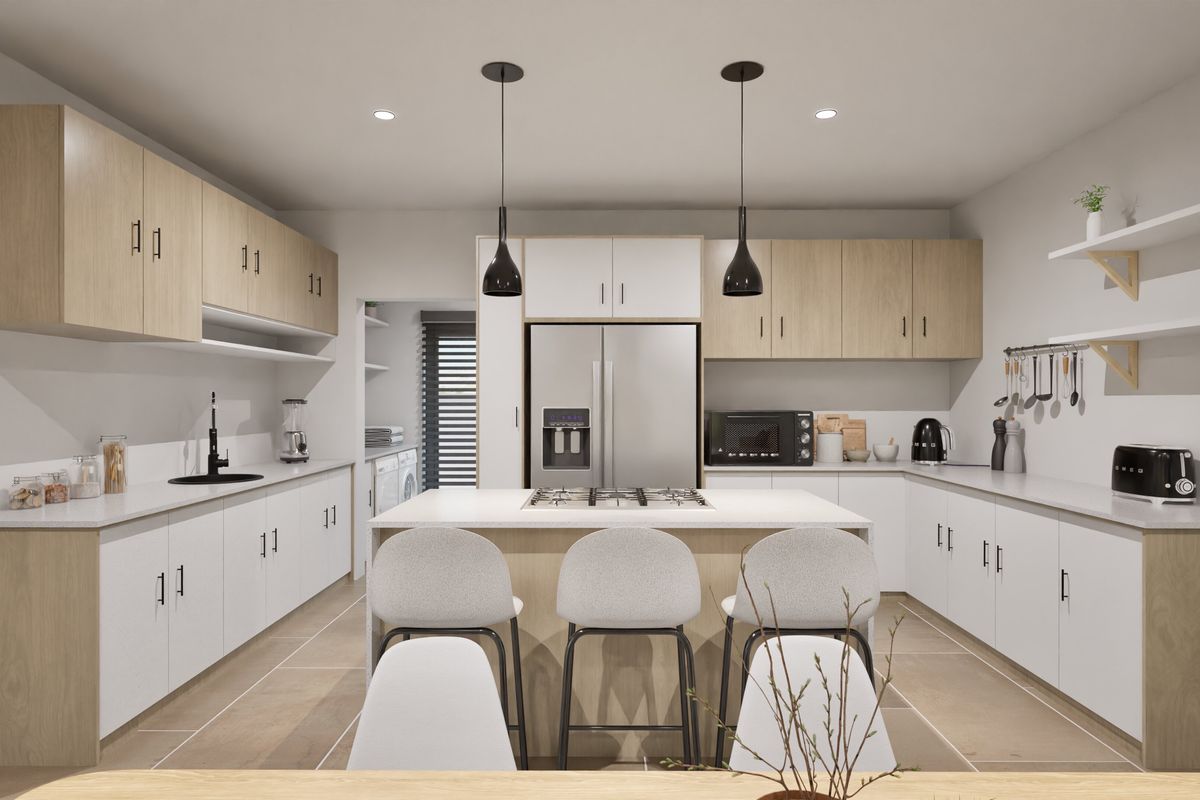 Modern open-plan kitchen featuring light wood cabinetry, white countertops, a central island with a gas hob, and integrated appliances.
