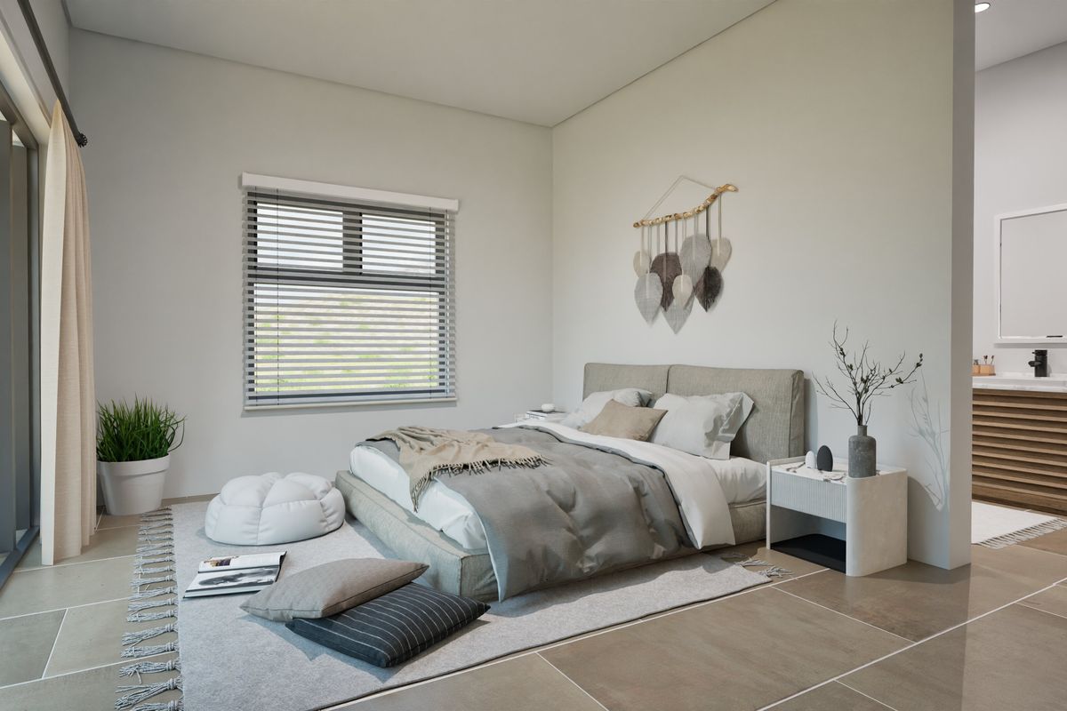 A modern bedroom featuring neutral tones, large format floor tiles, and an integrated en-suite bathroom area with a wooden vanity.