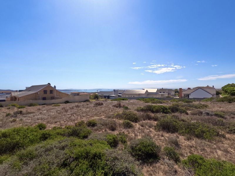 Vacant Plot for Sale___  Prime Opportunity: Build Your Dream Home with Stunning Lagoon Views - Photo 2