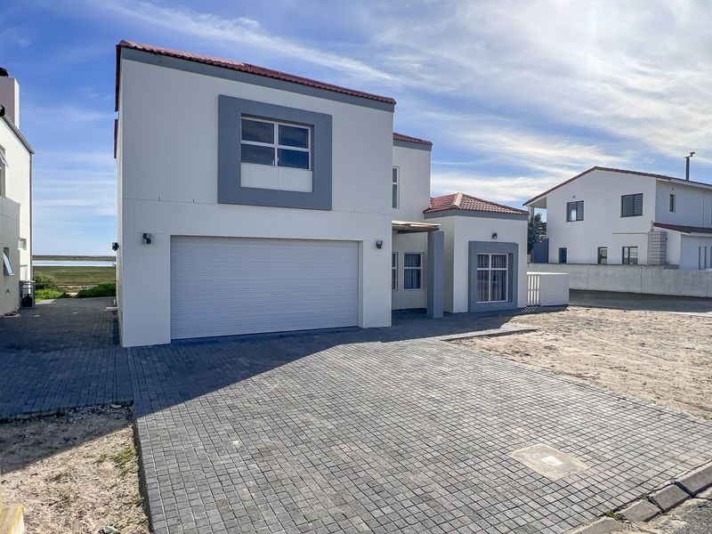 Riverfront Living in Port Owen – Spacious Double-Storey Home with Stunning Views - Photo 2