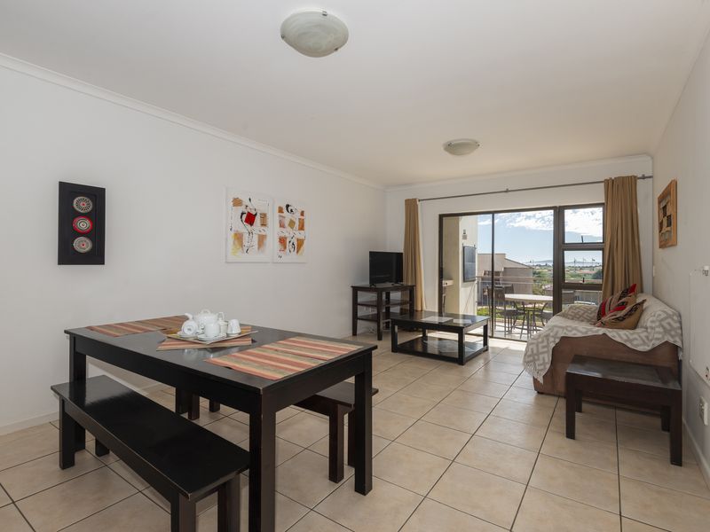 Tranquil First-Floor Apartment with Lagoon Views & Two Garages - Photo 7