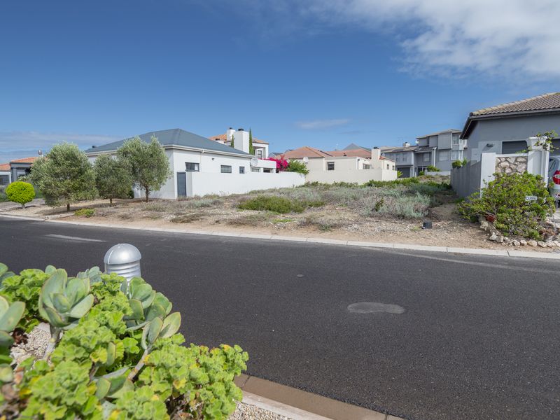 Prime Coastal Plot with Greenbelt Views – Build Your Dream Home in Calypso Estate - Photo 2