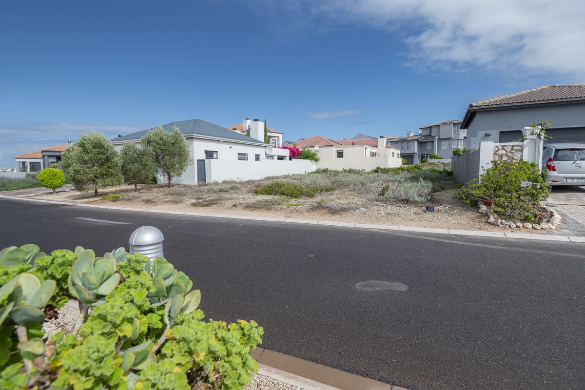 Prime Coastal Plot with Greenbelt Views – Build Your Dream Home in Calypso Estate - Photo 2