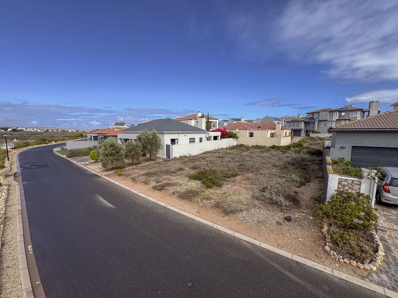 Prime Coastal Plot with Greenbelt Views – Build Your Dream Home in Calypso Estate - Photo 3