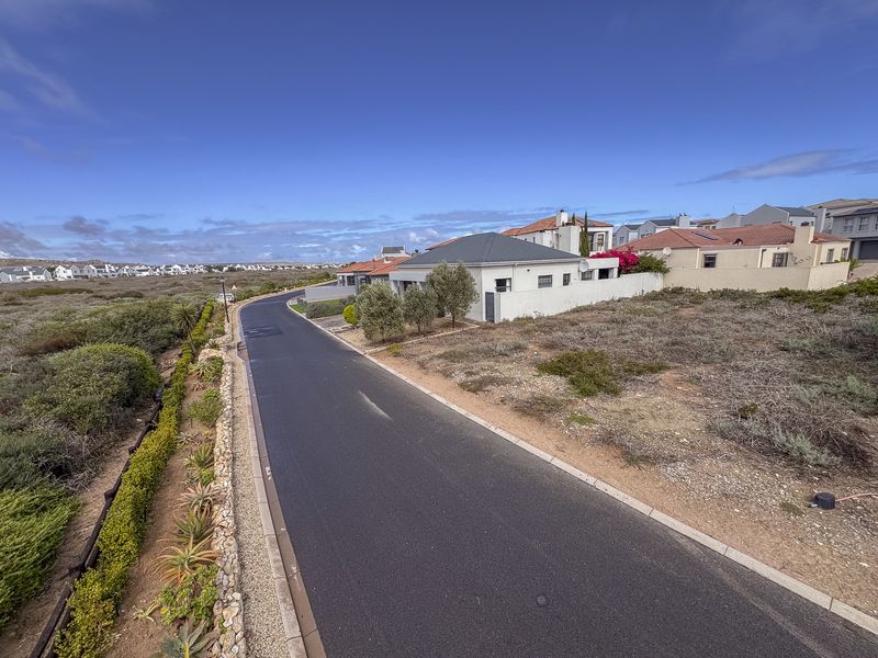 Prime Coastal Plot with Greenbelt Views – Build Your Dream Home in Calypso Estate - Photo 10