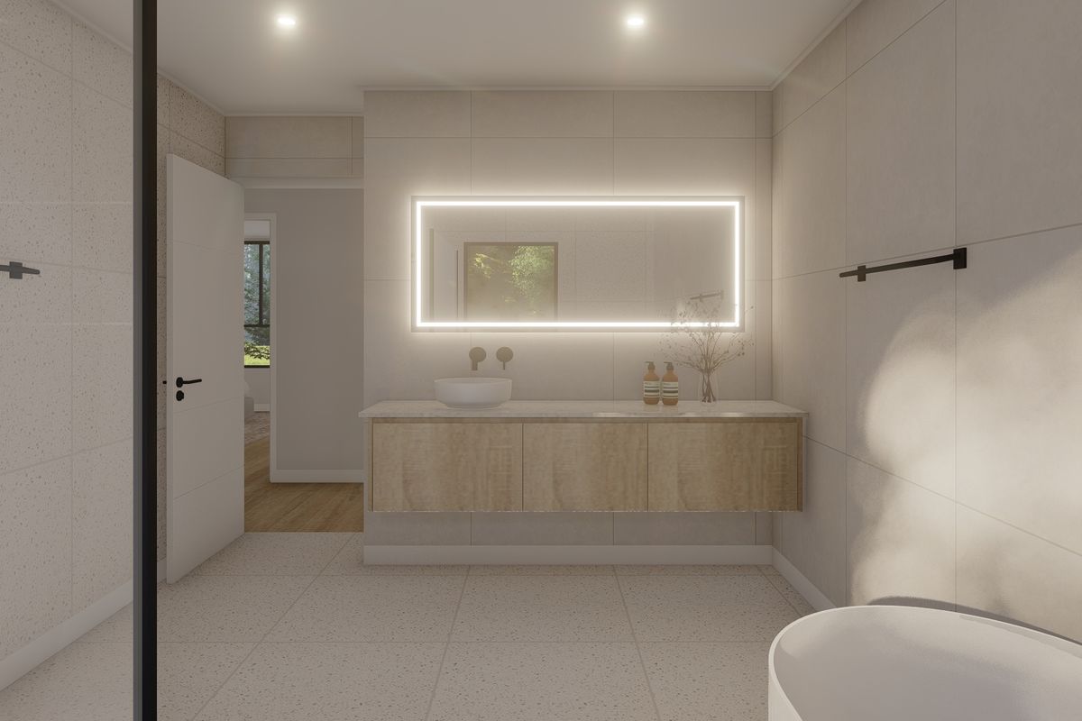 Modern bathroom featuring a floating vanity, vessel sink, backlit mirror, and a freestanding bathtub with high-quality tiled finishes.