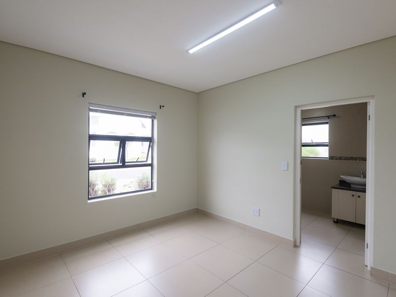 SECURE COASTAL SANCTUARY IN BLUE LAGOON: MODERN FAMILY LIVING STEPS FROM THE BEACH - Photo 7