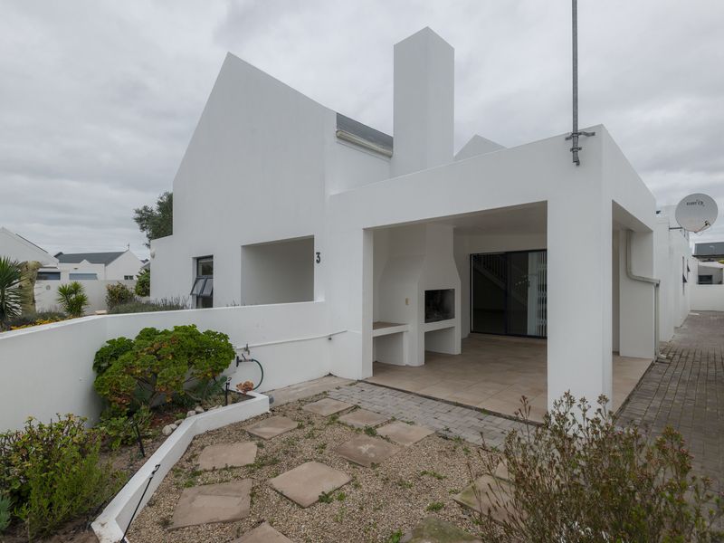 SECURE COASTAL SANCTUARY IN BLUE LAGOON: MODERN FAMILY LIVING STEPS FROM THE BEACH - Photo 5