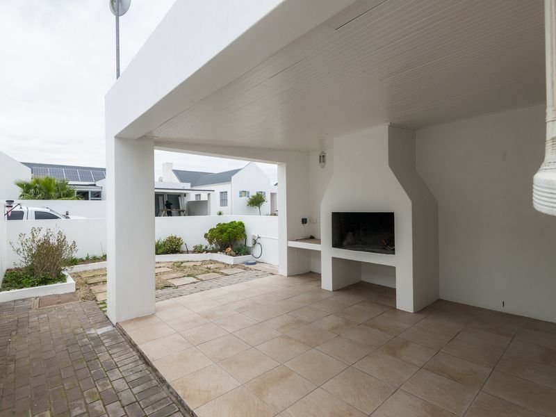 SECURE COASTAL SANCTUARY IN BLUE LAGOON: MODERN FAMILY LIVING STEPS FROM THE BEACH - Photo 6