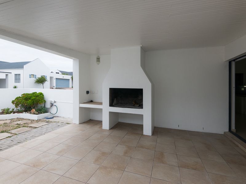 SECURE COASTAL SANCTUARY IN BLUE LAGOON: MODERN FAMILY LIVING STEPS FROM THE BEACH - Photo 3