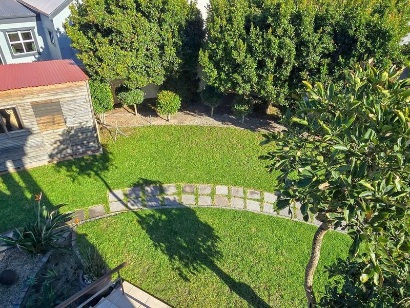 Impressive Double-Storey Home with Lagoon Views and Relaxed Coastal Living - Photo 5