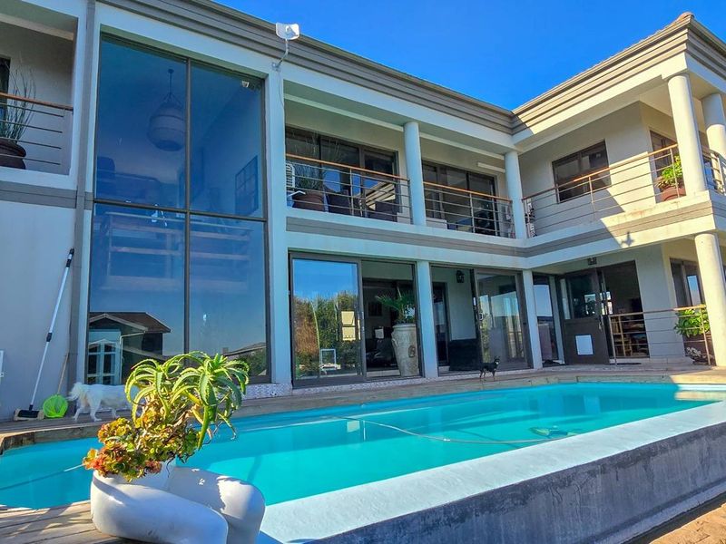 Impressive Double-Storey Home with Lagoon Views and Relaxed Coastal Living - Photo 8