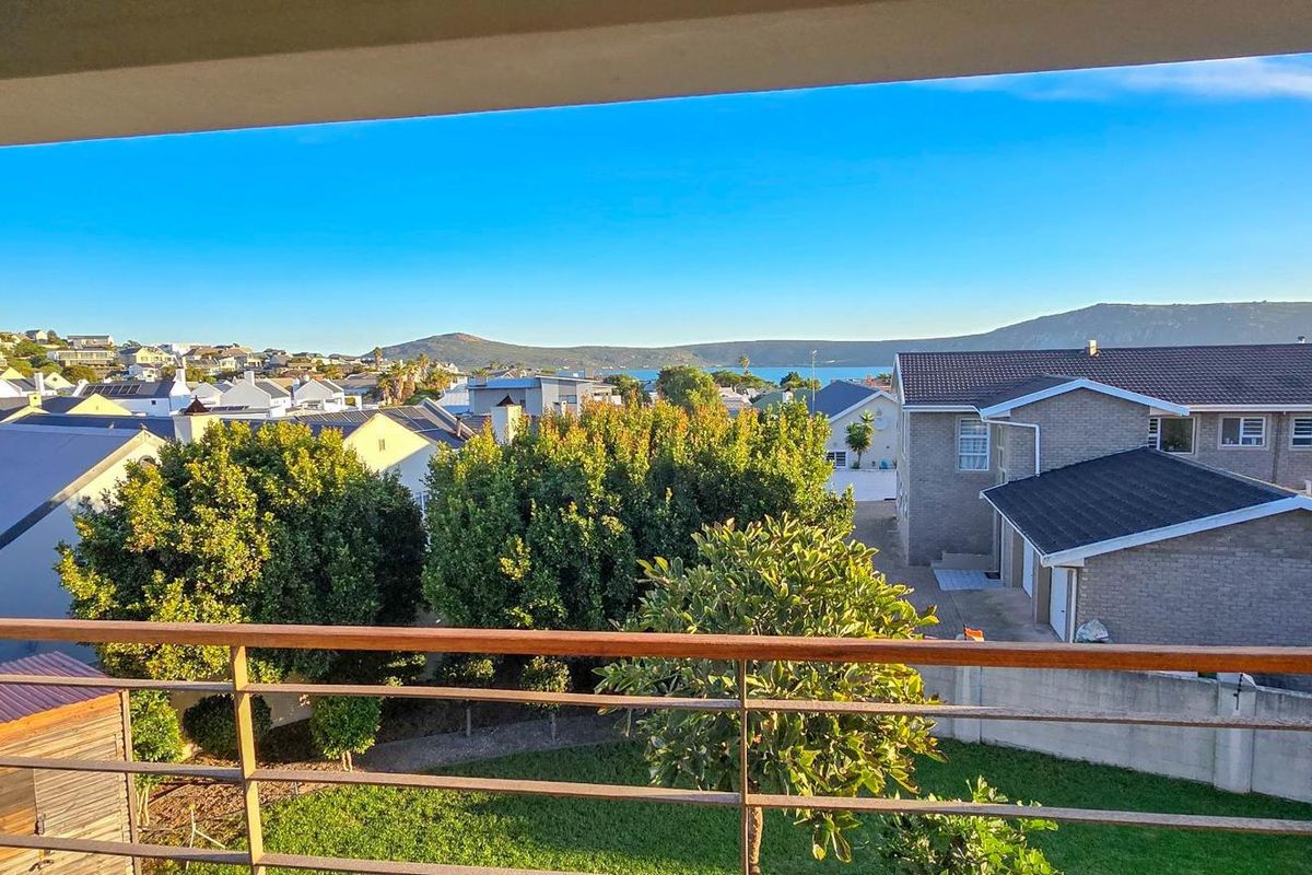 Impressive Double-Storey Home with Lagoon Views and Relaxed Coastal Living - Photo 4