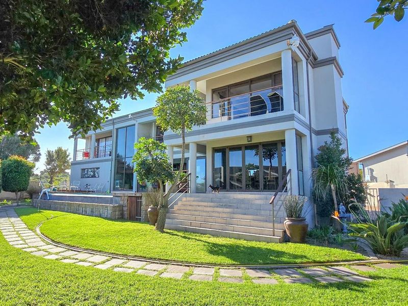 Impressive Double-Storey Home with Lagoon Views and Relaxed Coastal Living - Photo 2