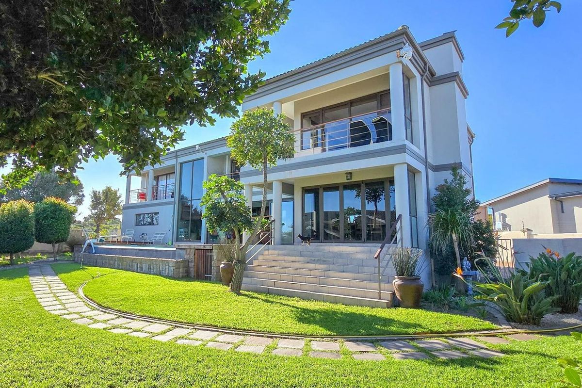 Impressive Double-Storey Home with Lagoon Views and Relaxed Coastal Living - Photo 2