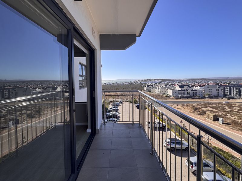 2 Bedroom + 2 Bath |  Top-Floor Coastal Sophistication with Panoramic Lagoon Views - Photo 7